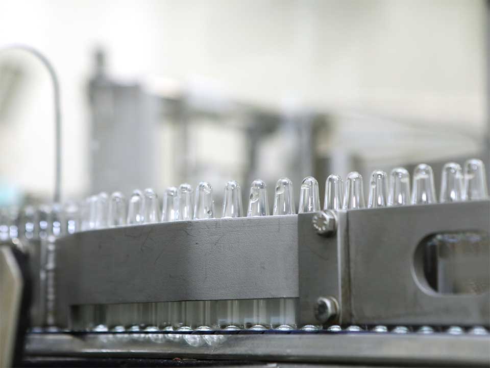 Clear ampoules on production line